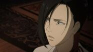 Yut-Lung looks at Eiji