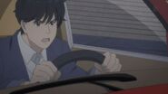 Eiji about to drive away with Ash