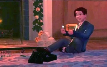 Tommy holding Captain Candy.