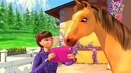 Skipper with her horse and her tablet