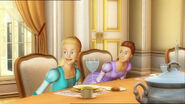 The twins listen to the announcement made by the butler