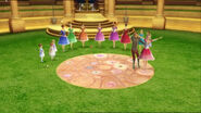 The princesses look on as Genevieve and Derek dance