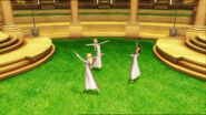 Delia dances with Edeline and Fallon