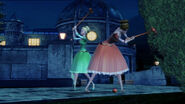 Delia and Edeline swing their croquet mallets