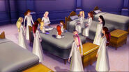 The girls listen to the story read by Genevieve