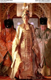 Li Gong in Curse of the Golden Flower, wearing the gown that inspired this doll's ensemble.