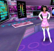 Christie standing next to a keyboard in Secret Agent Barbie.