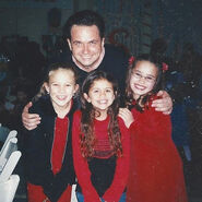 Dean Wendt hugs (left to right) Hayden Tweedie, Selena Gomez and Demi Lovato.