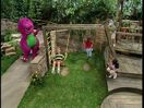 Barney, Whitney, and Mario watch Nick and Jackson swing on the swings.