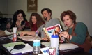 (Left to right) Julie Johnson (voice of Baby Bop), Patty Wirtz (voice of BJ), Bob West (voice of Barney), and Carol Farabee (voice understudy for Baby Bop and BJ) at a table read.