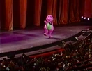 Barney sings "The More We Get Together" in front of a big crowd.