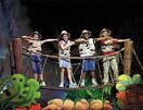 The children on a bridge in the jungle.