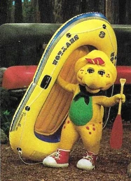 BJ with his boat in Camp WannaRunnaRound.