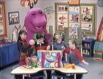 Barney and the children look through The Barney Bag to help them make beanbags.