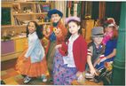 The children's cast of Barney's Best Manners: Your Invitation to Fun! in silly dress-up clothes.