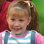 Kathy smiling (as seen in "My Family's Just Right For Me").