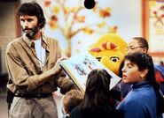 Bruce Deck, a Barney & Friends director, on set with the cast of this episode, "On The Move"