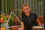 Megan playing the triangle (as seen in "The Chase").