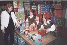 Santa's Elves ((Left to right) Oscar, Gilford, and Snowflake) talking to Sloan Coleman on set.