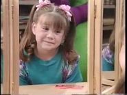 Kathy looking at herself in the mirror