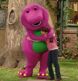 Taylor and Barney share a hug in the park (as seen in "The Good Egg: Kenya").