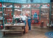 (Left to right) Art Director Elizabeth Velton, prop master and lead man Dave Cobb, and production designer Jess Nelson on the set of Santa's workshop from Waiting for Santa.