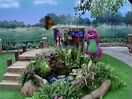 Barney and the children looking at butterflies on the school playground (from the episode "Once A Pond A Time").