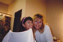 Pia Hamilton (alongside a lady) inside a dressing room.