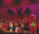 Barney and the kids singing "Happy Birthday to Me" in the earlier run of the show in 1996. Note the slight differences in set design.