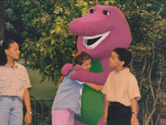 Barney hugs Hannah.
