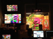 Behind the scenes shot of Barney & the host