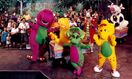 Barney, Baby Bop, BJ, Mr. Peekaboo and the audience pose with inflatable farm animals.