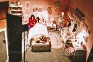 Tina's mother reading her daughter a bedtime story on set during the filming