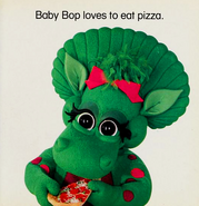 Page 11. Baby Bop loves to eat pizza.