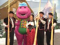 Barney posing with the Alphorn players.