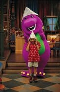 Barney and Mario wearing triangle hats