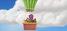 Barney, Ben and Emma in a hot air balloon.