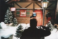 Production designer Jess Nelson on the set of Santa's workshop. Cameraman Paul Gore, filming.