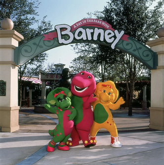 Barney, BJ and Baby Bop in front of A Day in the Park With Barney entrance