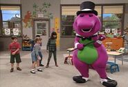 Barney happy dances in his tap shoes.