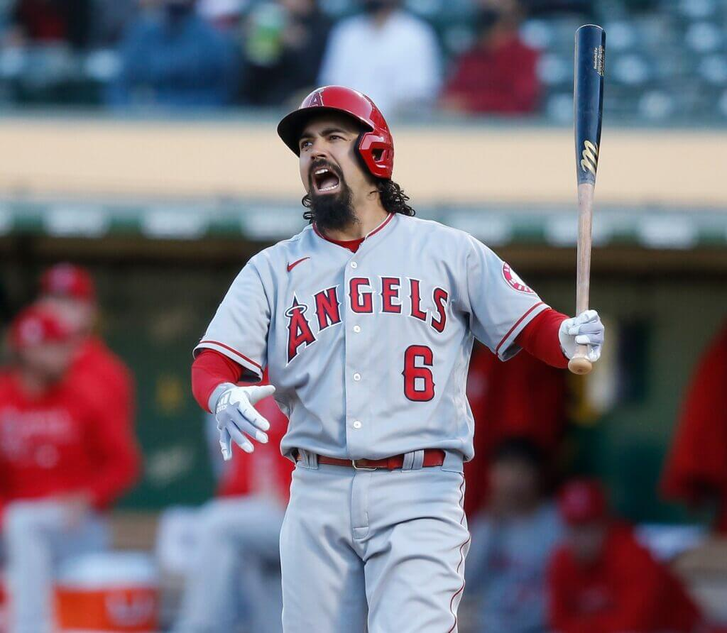 Washington Nationals' Anthony Rendon, right, walks to first