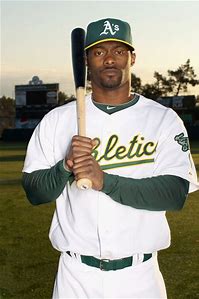 Jai Miller of the Oakland Athletics crosses home plate after