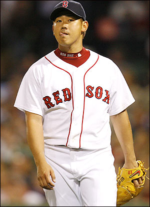 Boston Red Sox starting pitcher Daisuke Matsuzaka makes the out on
