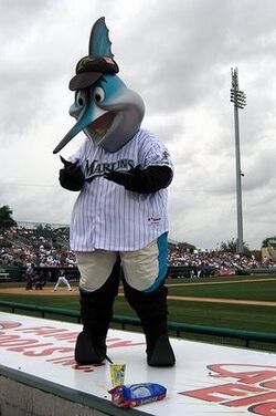 Hero mascot Billy the Marlin dives onto pavement for foul ball, delivers to  young fan