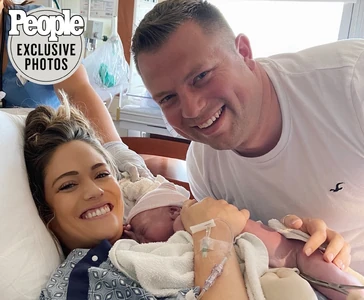 Zach, Whitney, and baby Jadon.
