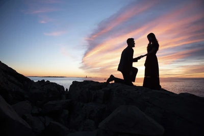 Evan proposing to Carlin.