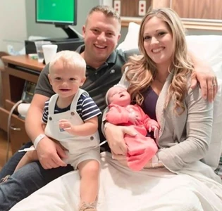 Zach, Whitney, Bradley, and baby Kaci.