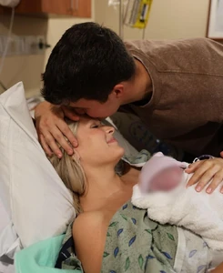 Katie, Travis, and baby Harvey.