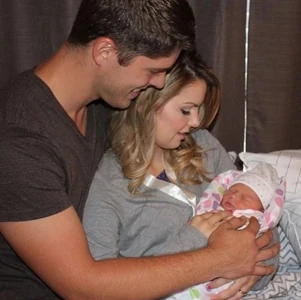 John, Alyssa, and baby Allie.