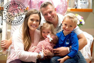 Zach, Whitney, Bradley, Kaci, and baby Khloé.